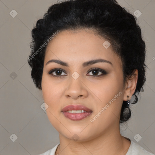 Joyful latino young-adult female with short  black hair and brown eyes