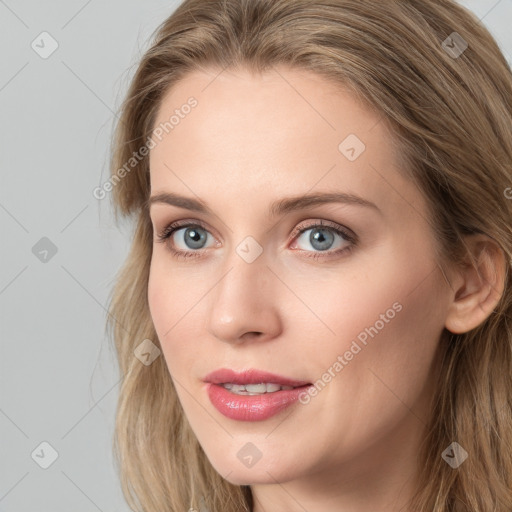 Joyful white young-adult female with long  brown hair and blue eyes