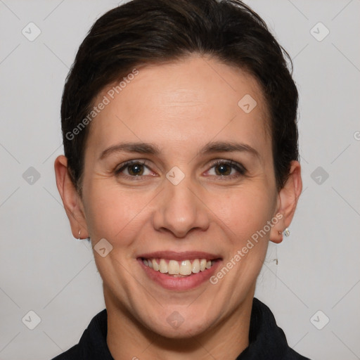 Joyful white adult female with short  brown hair and brown eyes