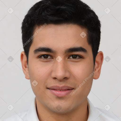 Joyful latino young-adult male with short  brown hair and brown eyes