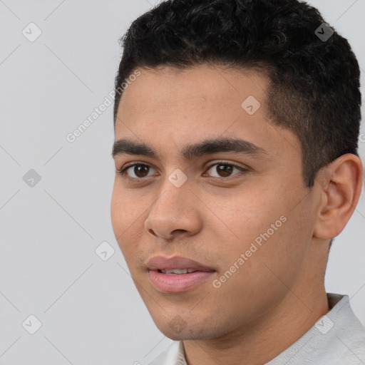 Neutral white young-adult male with short  black hair and brown eyes