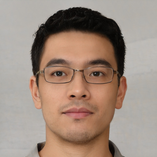 Neutral asian young-adult male with short  brown hair and brown eyes