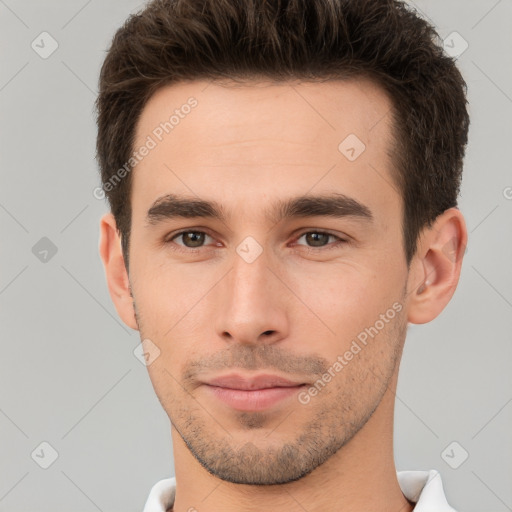 Neutral white young-adult male with short  brown hair and brown eyes