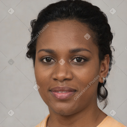 Joyful black young-adult female with medium  brown hair and brown eyes