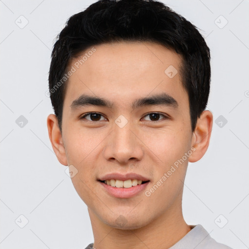 Joyful white young-adult male with short  black hair and brown eyes