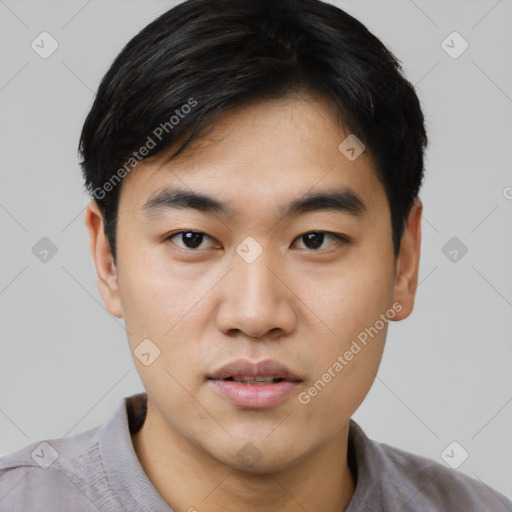 Neutral asian young-adult male with short  black hair and brown eyes