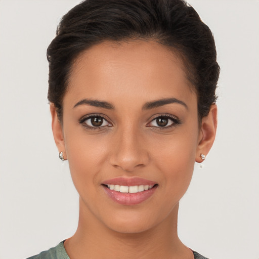 Joyful white young-adult female with short  brown hair and brown eyes