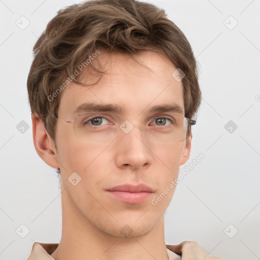 Neutral white young-adult male with short  brown hair and grey eyes