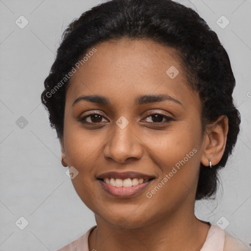 Joyful latino young-adult female with short  black hair and brown eyes