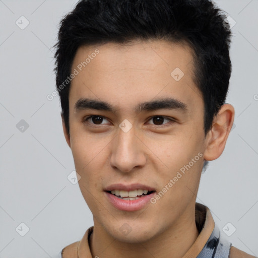 Joyful latino young-adult male with short  brown hair and brown eyes