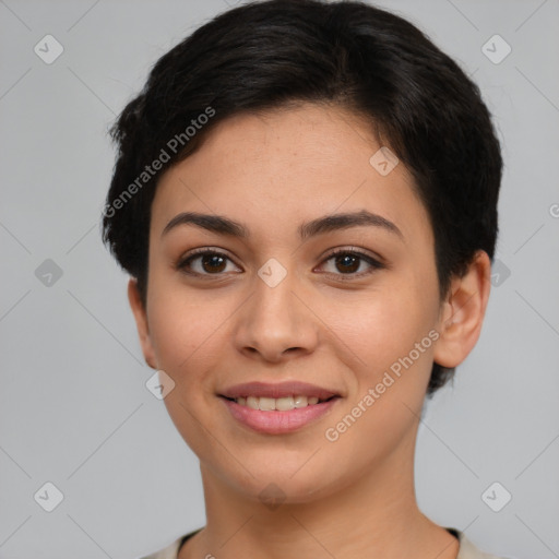 Joyful latino young-adult female with short  brown hair and brown eyes