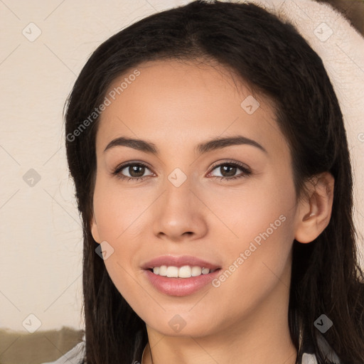 Joyful white young-adult female with long  black hair and brown eyes