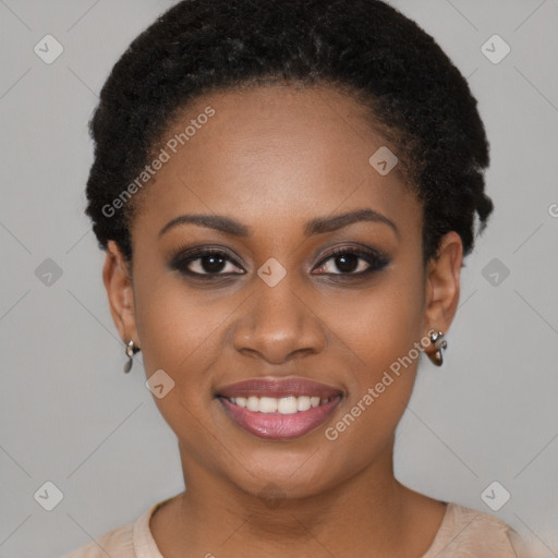 Joyful black young-adult female with short  brown hair and brown eyes