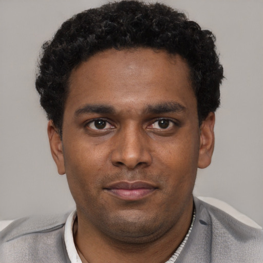 Neutral black young-adult male with short  brown hair and brown eyes