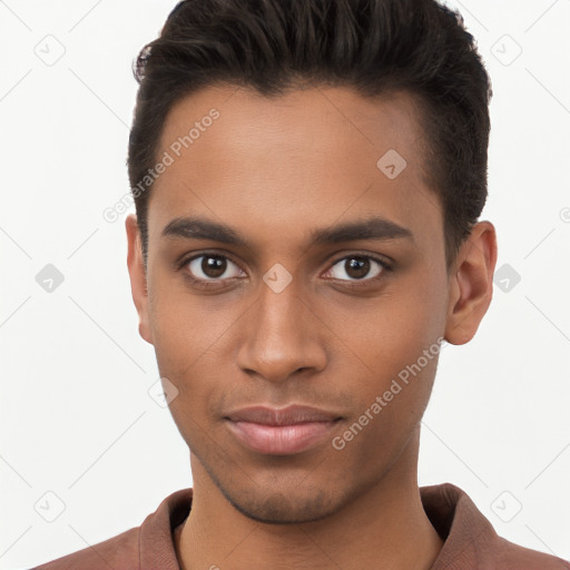 Joyful black young-adult male with short  brown hair and brown eyes