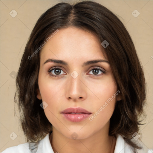 Neutral white young-adult female with medium  brown hair and brown eyes