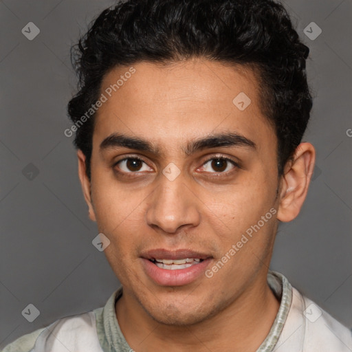 Joyful latino young-adult male with short  brown hair and brown eyes