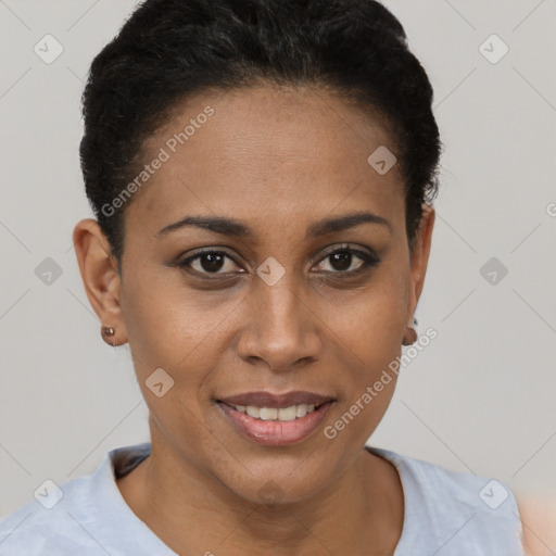 Joyful black young-adult female with short  brown hair and brown eyes