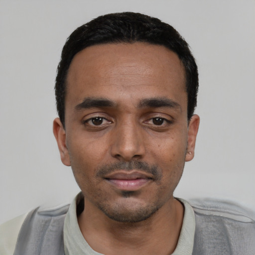 Neutral black young-adult male with short  black hair and brown eyes