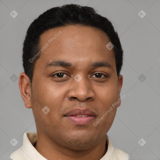 Joyful latino young-adult male with short  brown hair and brown eyes