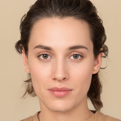 Neutral white young-adult female with medium  brown hair and brown eyes