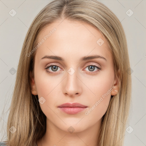 Neutral white young-adult female with long  brown hair and brown eyes