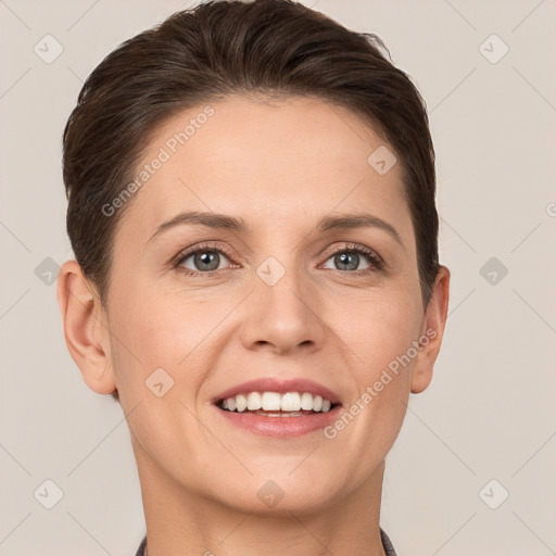 Joyful white young-adult female with short  brown hair and grey eyes