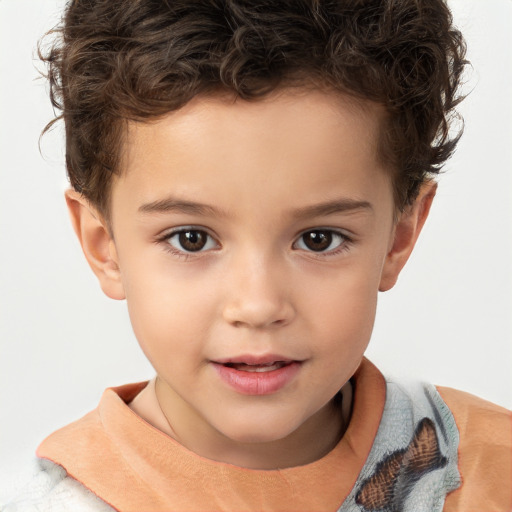 Joyful white child male with short  brown hair and brown eyes