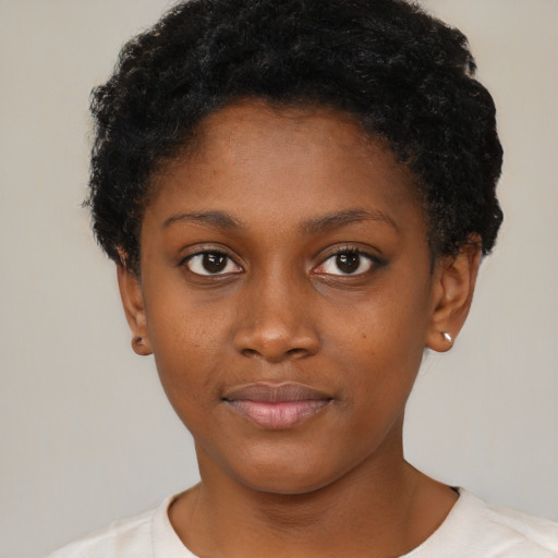 Neutral black young-adult female with short  brown hair and brown eyes