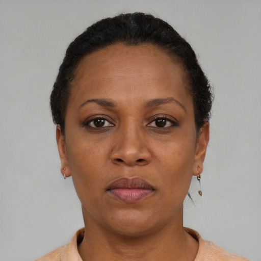 Neutral black adult female with short  black hair and brown eyes