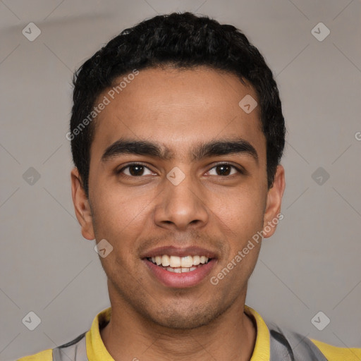 Joyful latino young-adult male with short  black hair and brown eyes