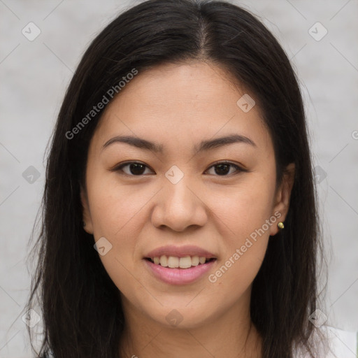 Joyful latino young-adult female with long  brown hair and brown eyes