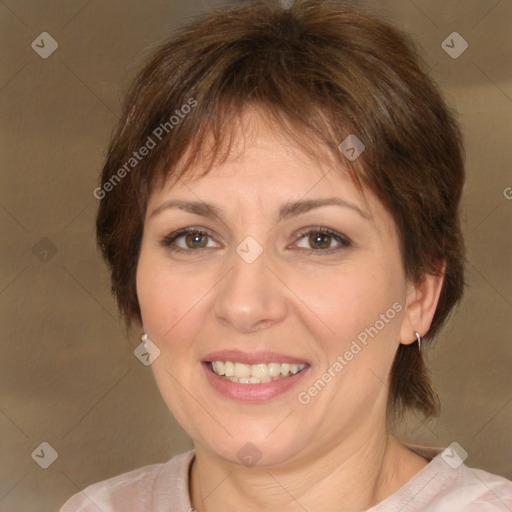 Joyful white adult female with medium  brown hair and brown eyes