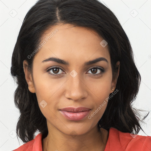 Joyful latino young-adult female with long  brown hair and brown eyes