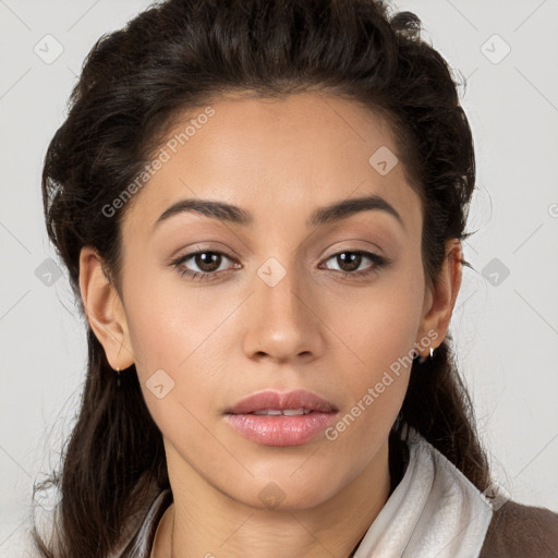 Neutral white young-adult female with long  brown hair and brown eyes