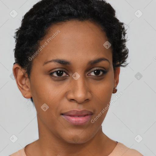 Joyful black young-adult female with short  brown hair and brown eyes