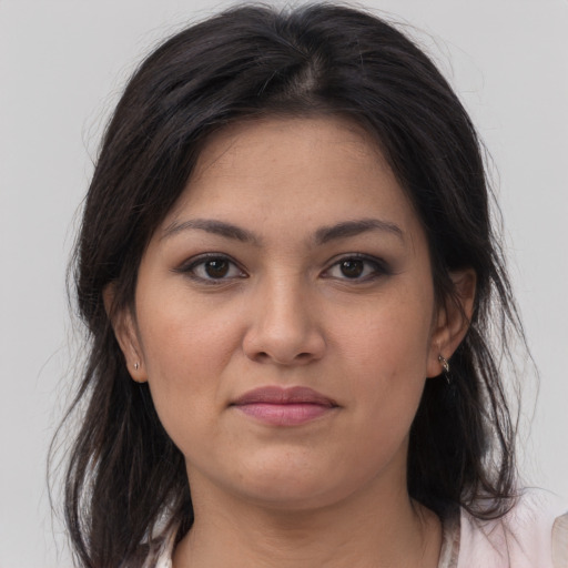 Joyful white young-adult female with medium  brown hair and brown eyes