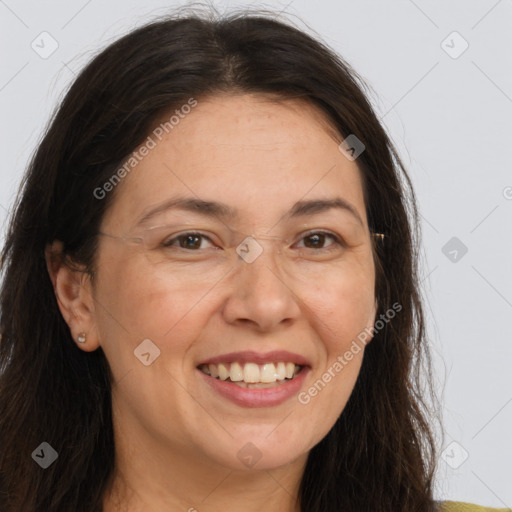 Joyful white adult female with long  brown hair and brown eyes