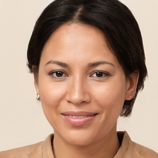 Joyful white young-adult female with medium  brown hair and brown eyes