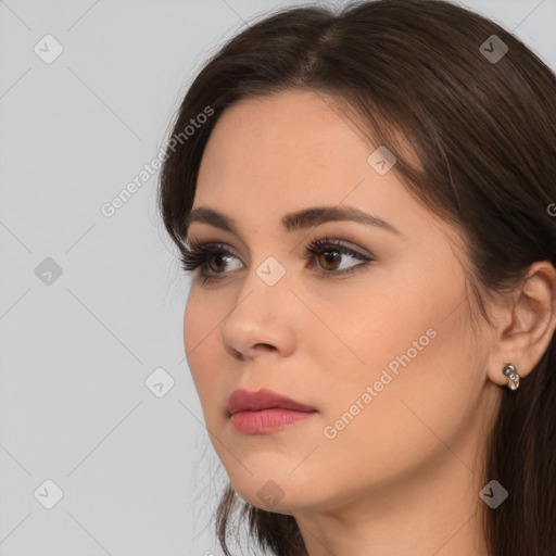 Neutral white young-adult female with medium  brown hair and brown eyes