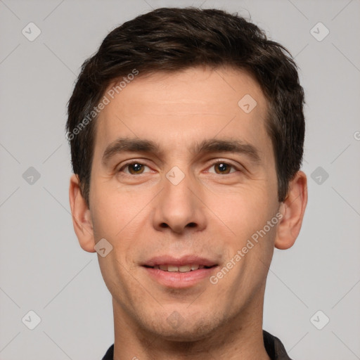 Joyful white young-adult male with short  brown hair and brown eyes