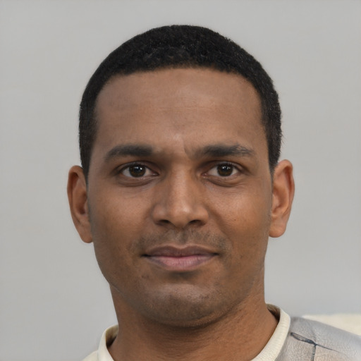 Neutral black young-adult male with short  black hair and brown eyes