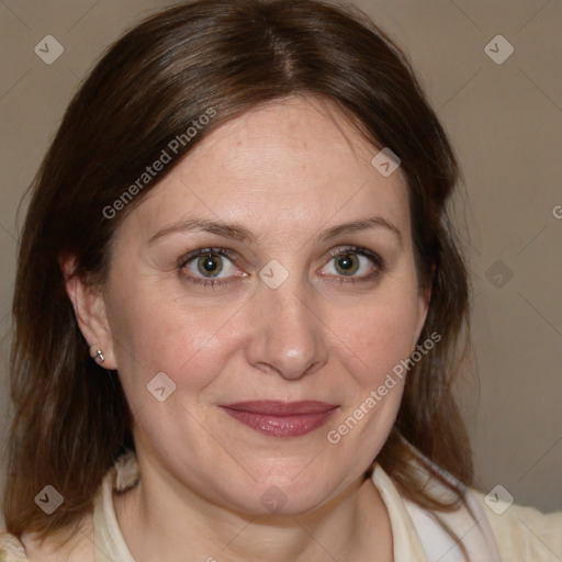 Joyful white adult female with medium  brown hair and brown eyes