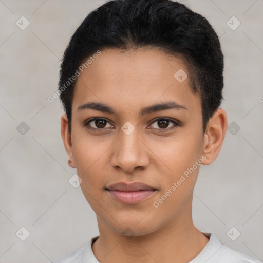 Joyful latino young-adult female with short  brown hair and brown eyes