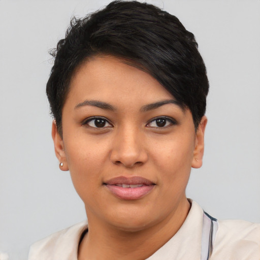 Joyful asian young-adult female with short  black hair and brown eyes