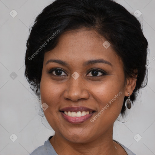 Joyful black young-adult female with medium  brown hair and brown eyes