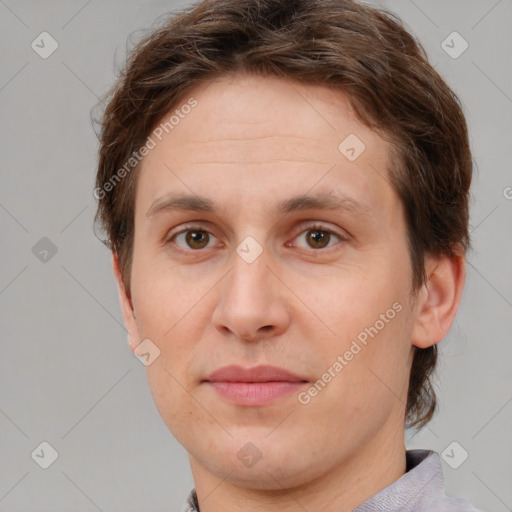 Joyful white adult female with short  brown hair and brown eyes