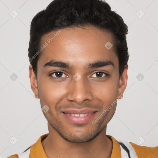 Joyful latino young-adult male with short  black hair and brown eyes