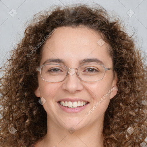 Joyful white adult female with long  brown hair and brown eyes