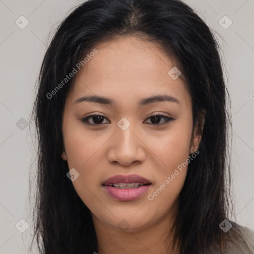 Joyful latino young-adult female with long  brown hair and brown eyes